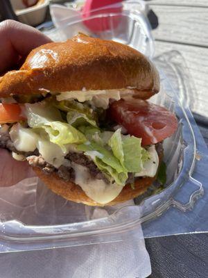 Smashburger with 2 patties, cheese, lettuce, tomato, pickles, mayo