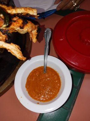 Red salsa served with dinner