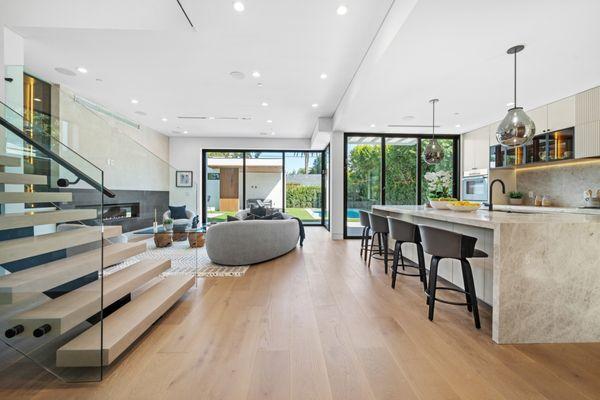 Complete house remodel, kitchen remodel, open concept, wood floors, fireplace, sliding doors.