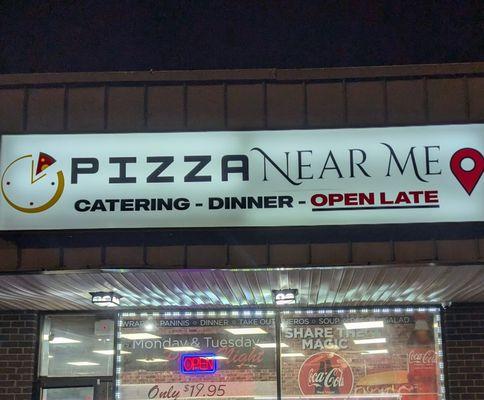 Store Front Sign. Open Until 12AM Sunday - Thursday. Open Until 2AM Thursday - Saturday.