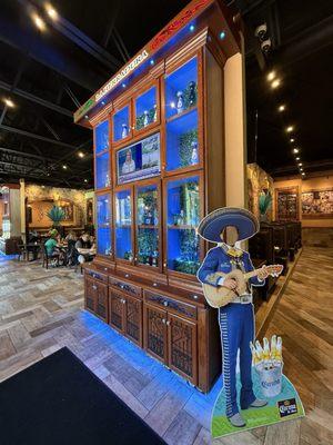 Their interactive liquor display case with the TV monitor. It has buttons on it that will light up each individual section of you choose.