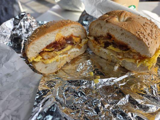Bacon, egg, cheese and hash brown on a toasted sesame bagel