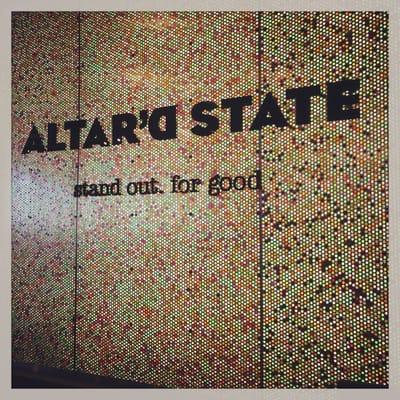 Behind the cash register.