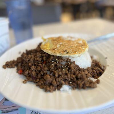 Spicy minced pork with fried egg over rice