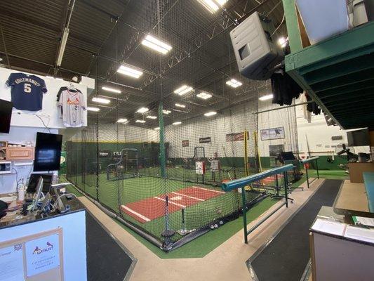 Our facility has two large hitting nets, and a long thin pitching tunnel.