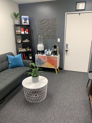 Our new boutique style waiting room to relax you before your treatment. Enjoy some water, coffee, or tea.