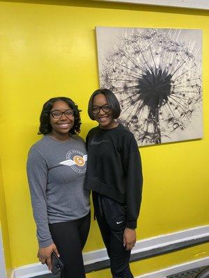 Blowout with body curls and cut and style they are both sister that travel far to experience the Amure outcome .