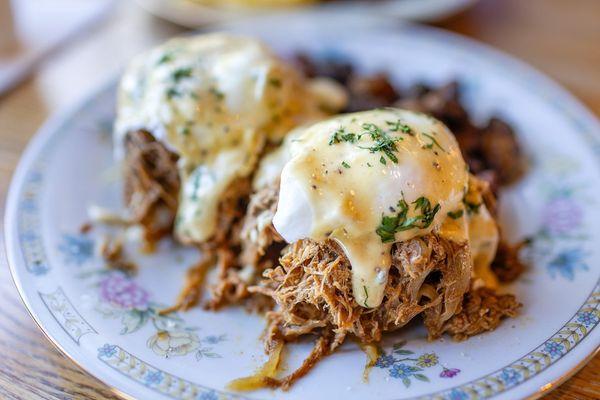 Pulled Pork Benedict over cracked pepper biscuits