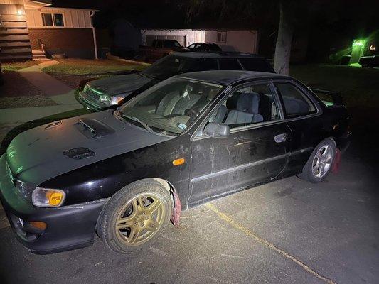 Before Photo of a 99 Impreza that was restored here.