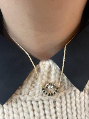 Necklace with diamonds and black sapphires.