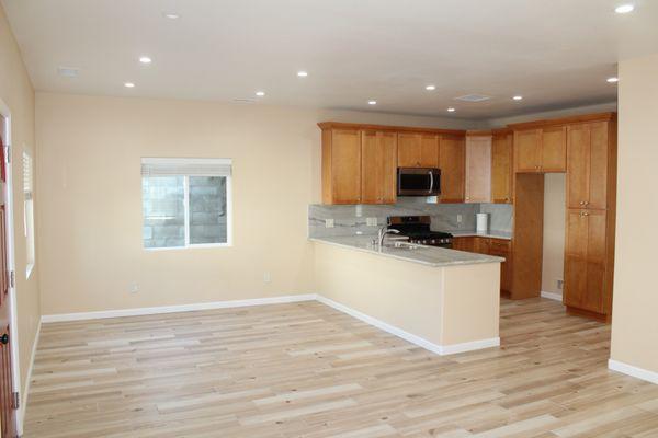 Spacious living spaces.
High end flooring and Kitchen cabinets and Granite Countertop