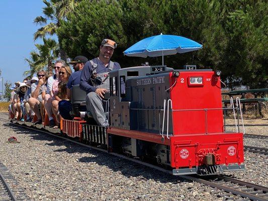 Passengers take a ride behind "The Beast" on a recent public run day.