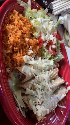 Chicken Flautas with no beans just rice. Delish!