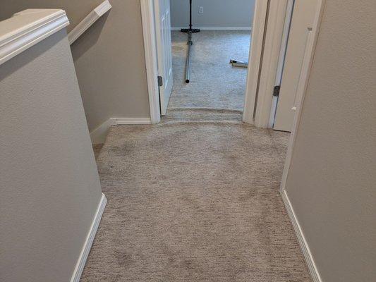 Carpet needs stretching.