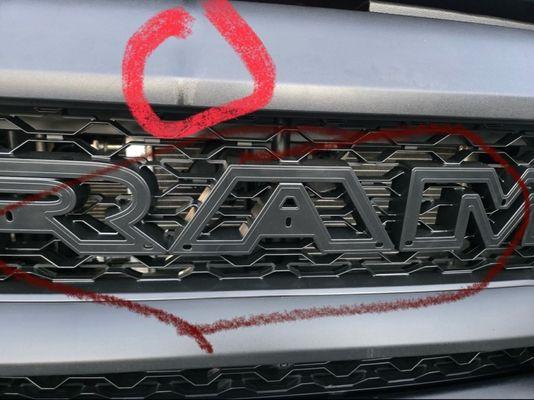 Stained grille, bottom grille replaced & didn't send the emblem RAM lettering that came with it.