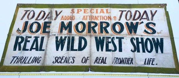 Very old Wild West Show banner.