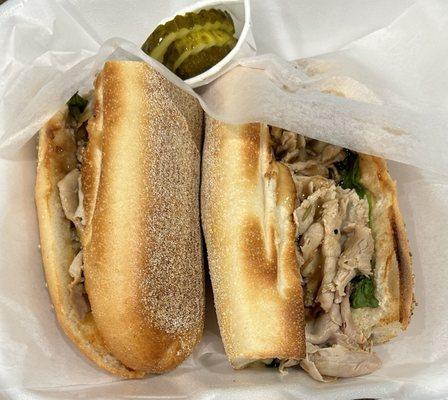 Roast Pork with spinach and sharp provolone on a toasted roll