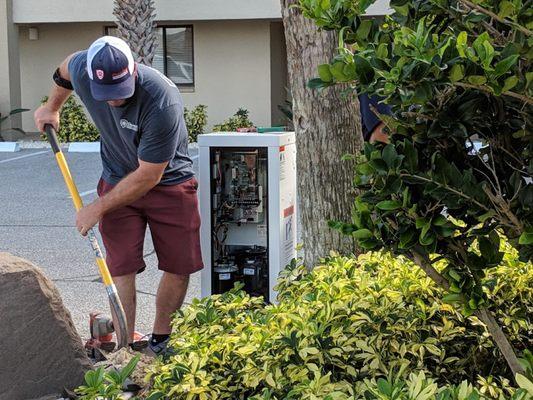 A Coastline Security installer with an entry gate for access control.