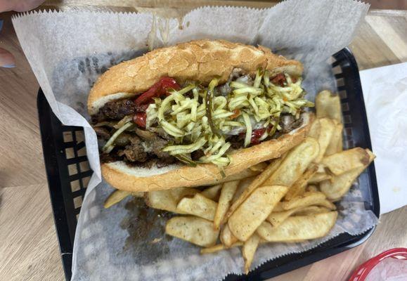 Cheesesteak with pickle slaw