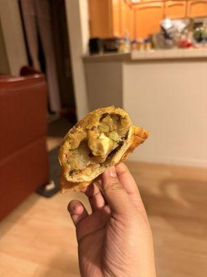 inside 19. Two Pieces Samosa (potatoes, peas, paneer)