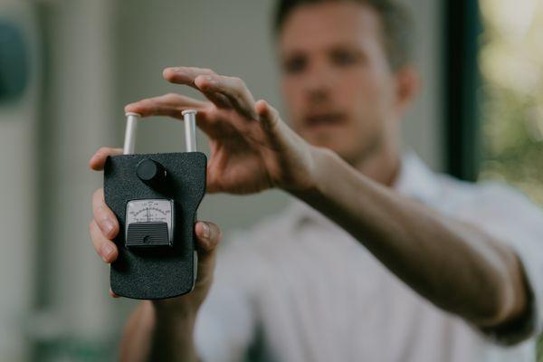 Dr. Sean explaining how the Delta-T instrument used during Gonstead Instrumentation.