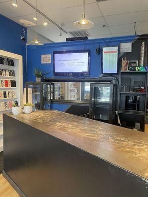 Prices on fixing phones posted up on the wall