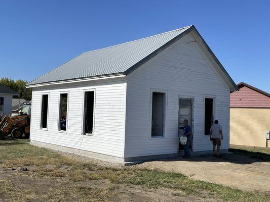 The Gresham School has now joined the lot and is ready for restoration.
