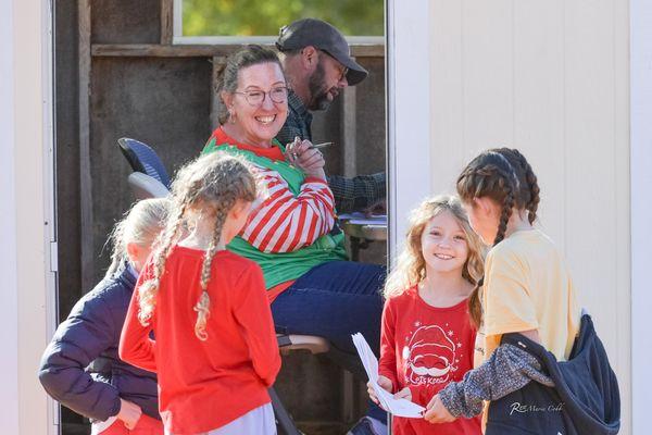 Our youth helping out by running dressage tests to the scorer