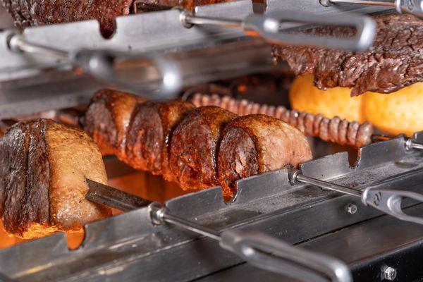 Concord, Espetus Brazilian Steak House, Sirloin Steak Skewer over an open flame