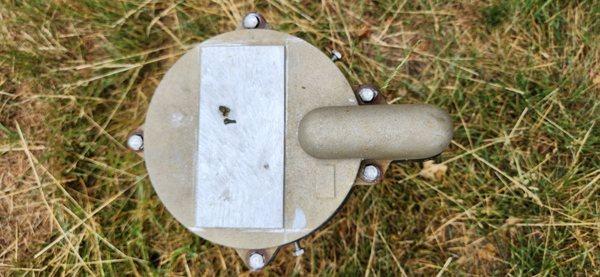 Replace existing cover with this ground down, used, rusted one when the old one looked new bit had a different company's logo on it.