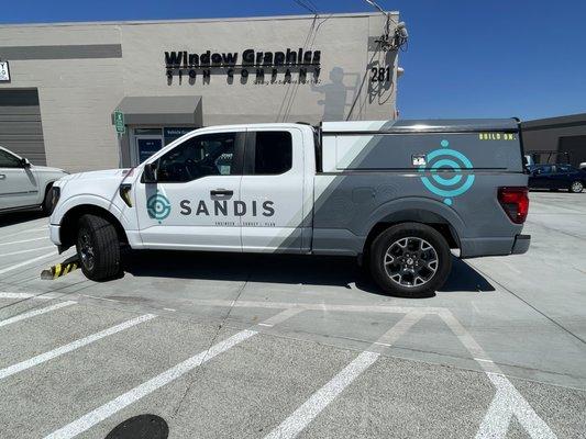 Commercial vehicle wrap; partial with spot graphics.