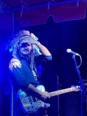 this is me on stage. I play guitar and sing.