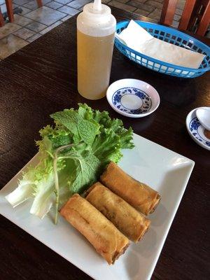 Egg Rolls come with squeeze bottle of sweetened fish sauce instead of standard way: in bowl with daikon & carrot