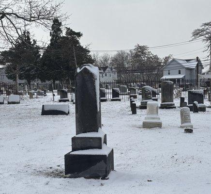 View from Lakeview Cemetery and Waverly Cemetery (other side of the fence)