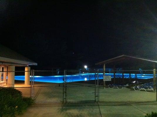 The swimming pool, lit up at night. (No, it's not open at night.)