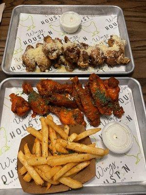 Garlic Parmesan Wings & Original Hot Wings w/ fries.