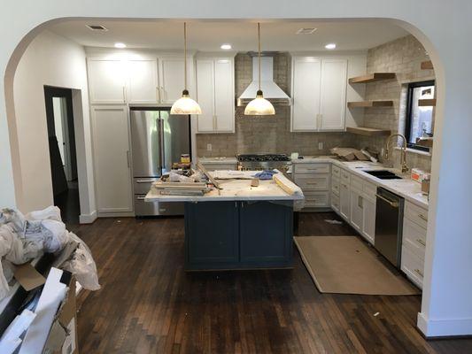 House was fully renovated inside and out by Burnett Unlimited to transform the space into a functional and stylish area for an Airbnb rent.