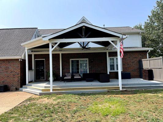 We added this covered porch over the deck to create a more usable space for these homeowners!