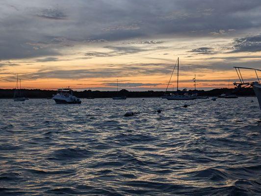 Beautiful sunset from the private sailing charter boat Our Passion.