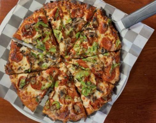 Classic Pepperoni Delight with Red Sauce, Mozarella Cheese, Pepperoni, Bell Pepper and Mushrooms .