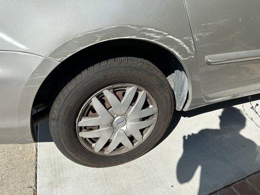 serious parking lot rash. looked bad. first company wanted to charge $800 to paint.