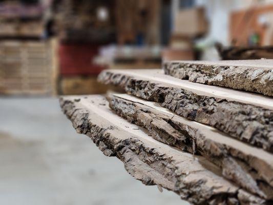 We have live edge walnut boards available in bulk.