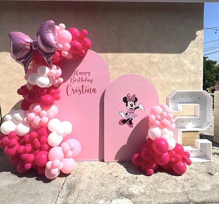 We help customers with their event decor. Minie Mouse Event Backdrop with balloons.