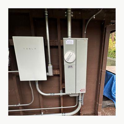 Our new main panel integrated with Sun Light and Power's TESLA Powerwall for maximum efficiency and planet friendliness