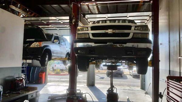 Another day at Super Auto Repair. Performing a fluid exchange bundle *Special* on the Chevrolet Silverado and CRV is due for brakes.