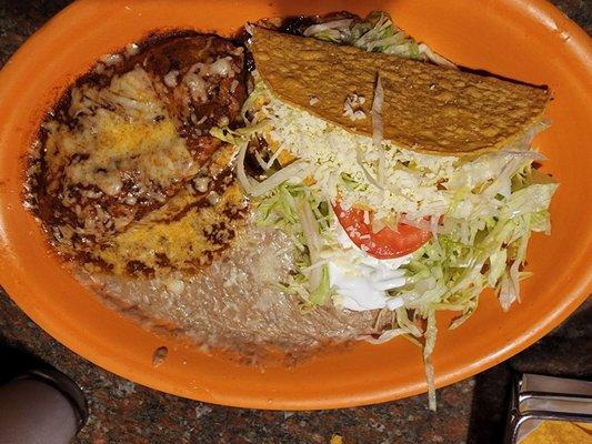 Hard shell taco with ground beef rice beans and chili relleno