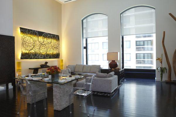 Living room with a decorative walll behind