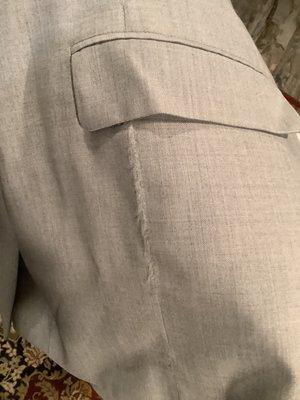 Ruined seam of suit coat on both sides - Beatty claims was "normal wear and tear" even though did not look like that when dropped off.