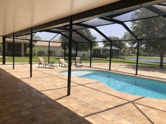 Free form pool with pan roof