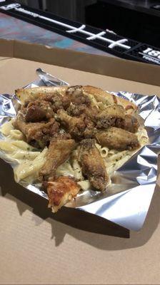 "Pasta Pizza" topped with Garlic Parm Wingz.. THE BEST!!